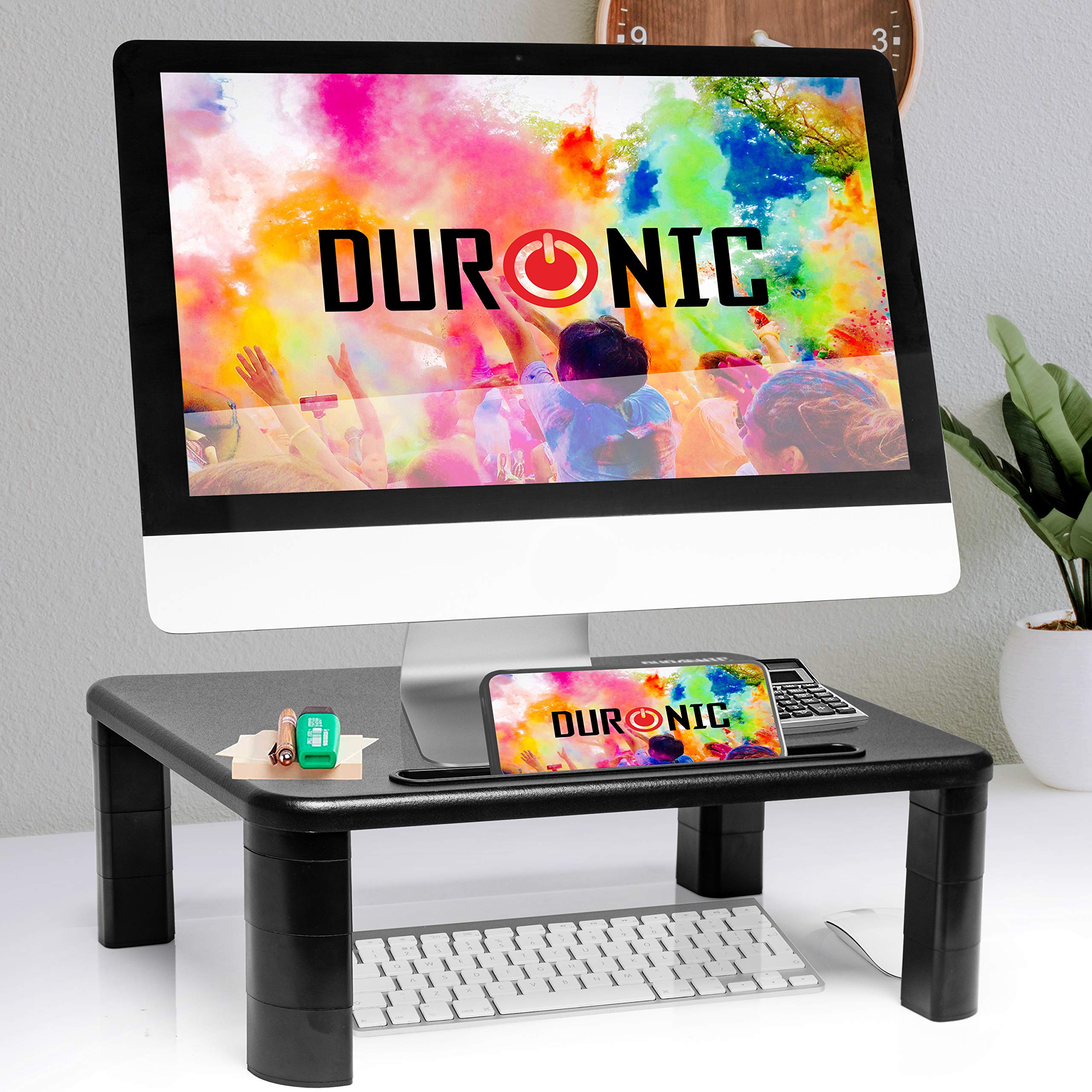 Duronic Monitor Stand Riser with a smartphone slot, holding an iMac on a desk.