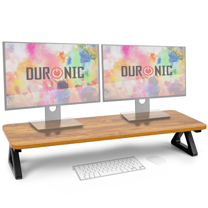 Duronic Monitor Stand Riser with a wide wood-effect shelf and black triangular metal legs.
