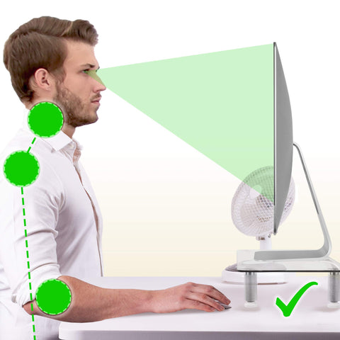 Duronic Monitor Stand Riser with correct ergonomic posture, looking at a properly elevated computer monitor.