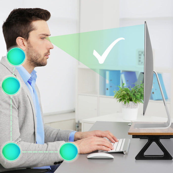 Duronic Monitor Stand Riser with man sitting with ergonomic posturs.