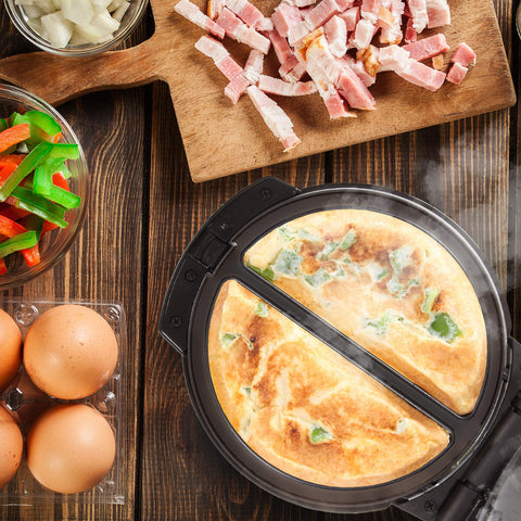 Duronic OM60 electric omelette pan cooking delicious omelettes surrounded by ingredients like peppers, meat