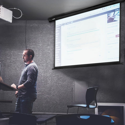 Duronic Projector Screen Electric with a man standing at a podium