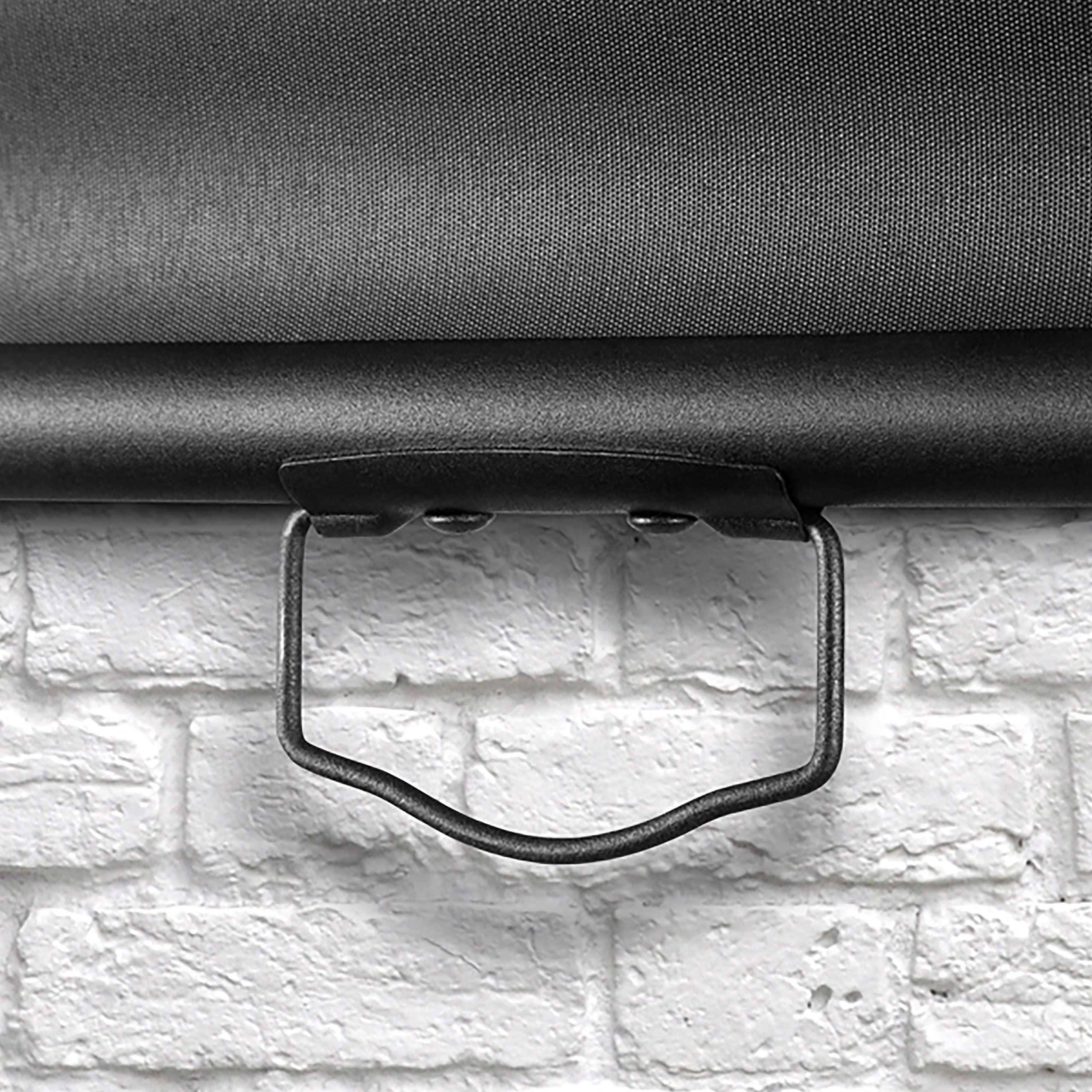 Duronic Projector Screen pull down projector screen handle against white brick wall background
