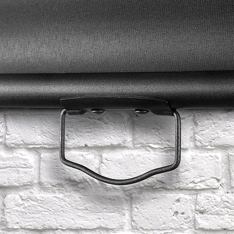 Duronic Projector Screen pull down projector screen handle against white brick wall background