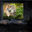 Duronic Projector Screen showing a tiger on a log, inside a room with a brick wall