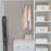 Duronic Projector Screen showing hanging clothes, organized storage boxes, and a tall black case
