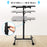 Duronic Projector Stand with height range of 26.6 to 39.4 inches and locking knob.