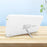 Duronic Sad Light Therapy Lamp Box with silver kickstand on wooden surface.