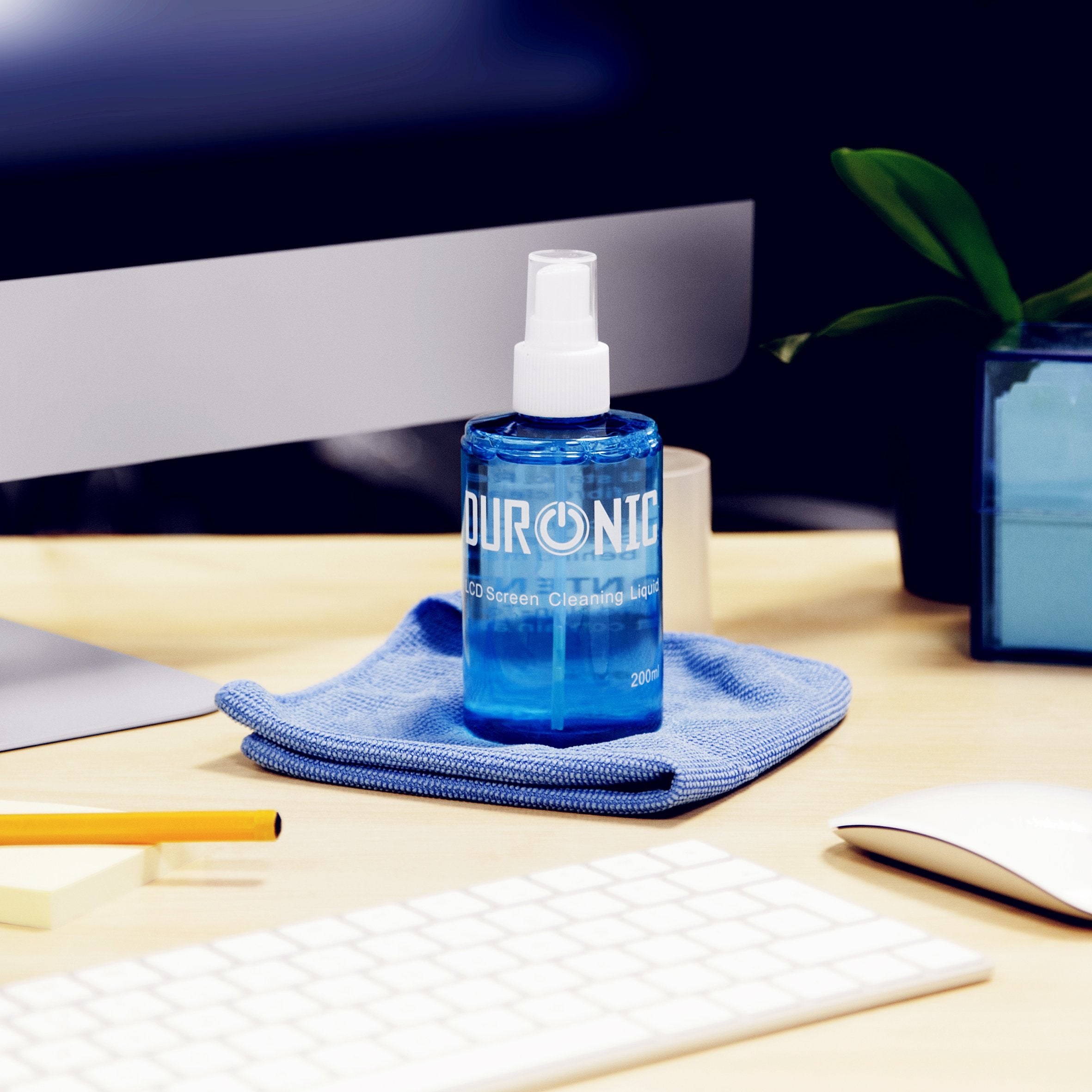 Duronic Screen Cleaner sitting on a folded microfiber cloth.