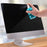 Duronic Screen Cleaner with a Hand spraying blue cleaning liquid onto a dusty desktop computer screen on a wooden table.