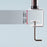 Duronic Single Monitor Stand showing adjustable thickness range of 0.5cm to 6.8cm (0.2in to 2.7in).