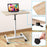 Duronic Sit-Stand Desk WPS67 with a light wood grain finish, featuring close-up views of the gas lift lever, locking wheels, and branded tabletop surface.