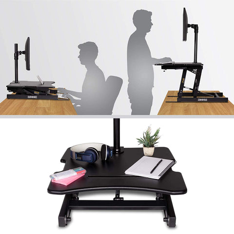Duronic Sit-Stand Desk adjustable for sitting or standing positions with monitor mount on wooden desk.