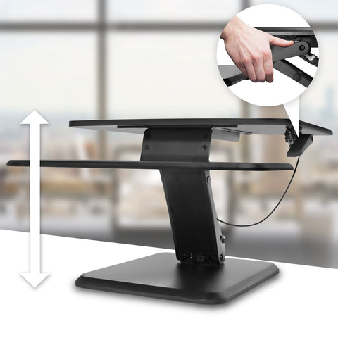 Duronic Sit-Stand Desk featuring a gas spring lift mechanism and a dual-tier design for ergonomic monitor and keyboard placement.