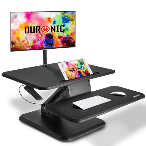 Duronic Sit-Stand Desk featuring a tiered design with a monitor mount, tablet slot, and keyboard tray.
