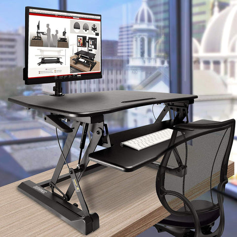 Duronic Sit-Stand Desk with keyboard tray, monitor mount, and mesh office chair.