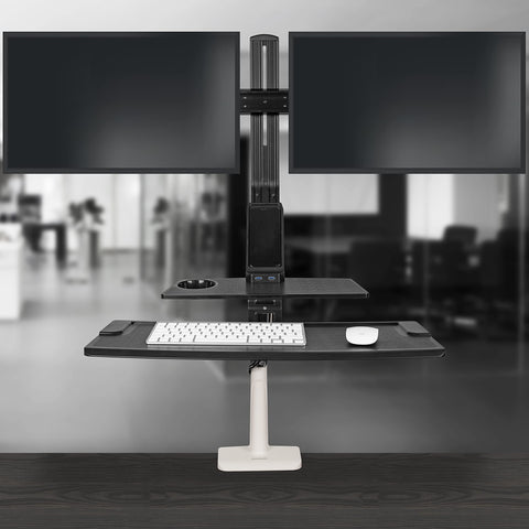 Duronic Sit Stand Desk Mount with dual monitor mounts, keyboard tray, and integrated USB ports.
