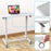 Duronic Sit Stand Desk Top with lockable wheels, lever adjustment, and rounded tabletop corners.