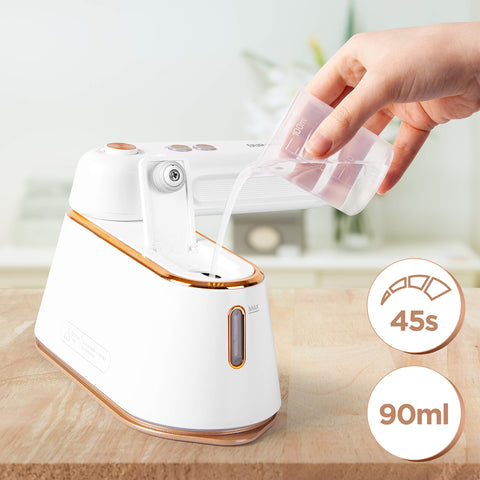 Duronic Steam Irons with water from a measuring cup on a wooden surface.