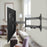 Duronic  TV Bracket holding a flat-screen television extended from the wall.