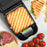 Duronic WM32 sandwich cooker cooking ham and tomato sandwich