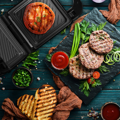 Duronic WM32 waffle cooker grilling tomatoes, meat, bread with condiments and spices