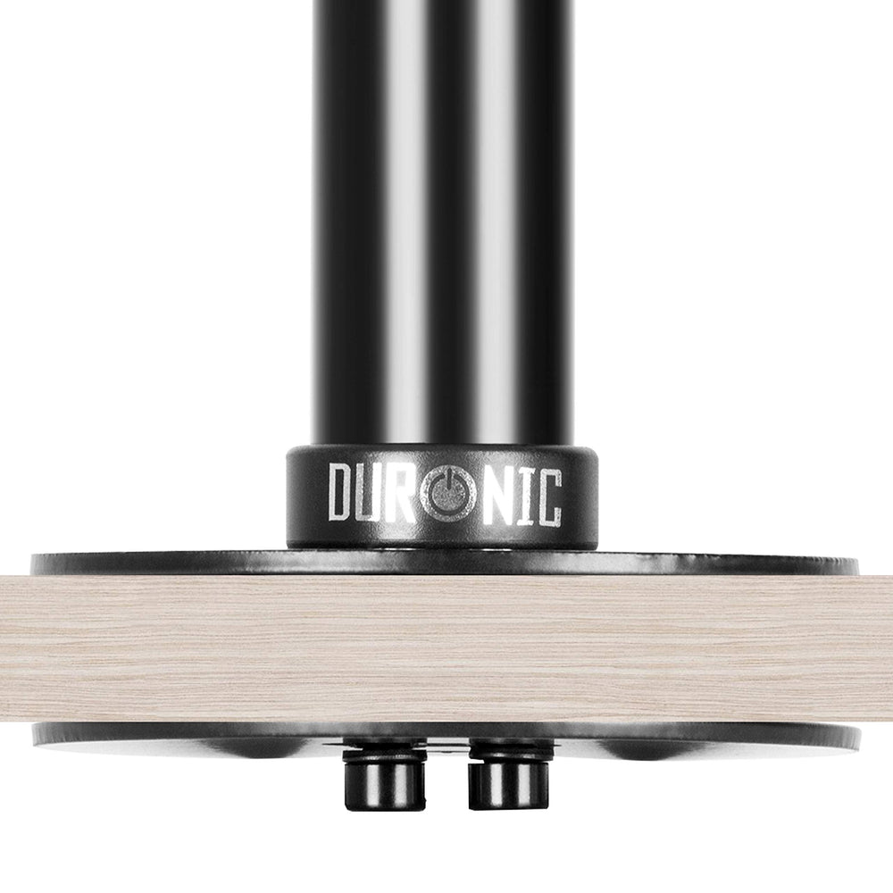 Duronic Wall Mount with black metal grommet mount secured to a light wood desk.