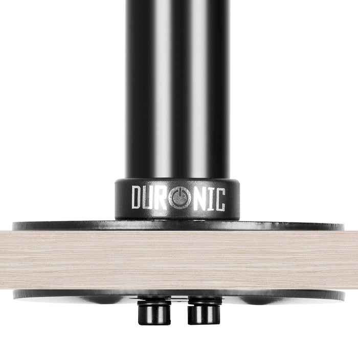 Duronic Wall Mount with black metal grommet mount secured to a light wood desk.