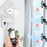 Duronic Wall Mounted Fan with remote control featuring three adjustable speed settings and airflow modes.