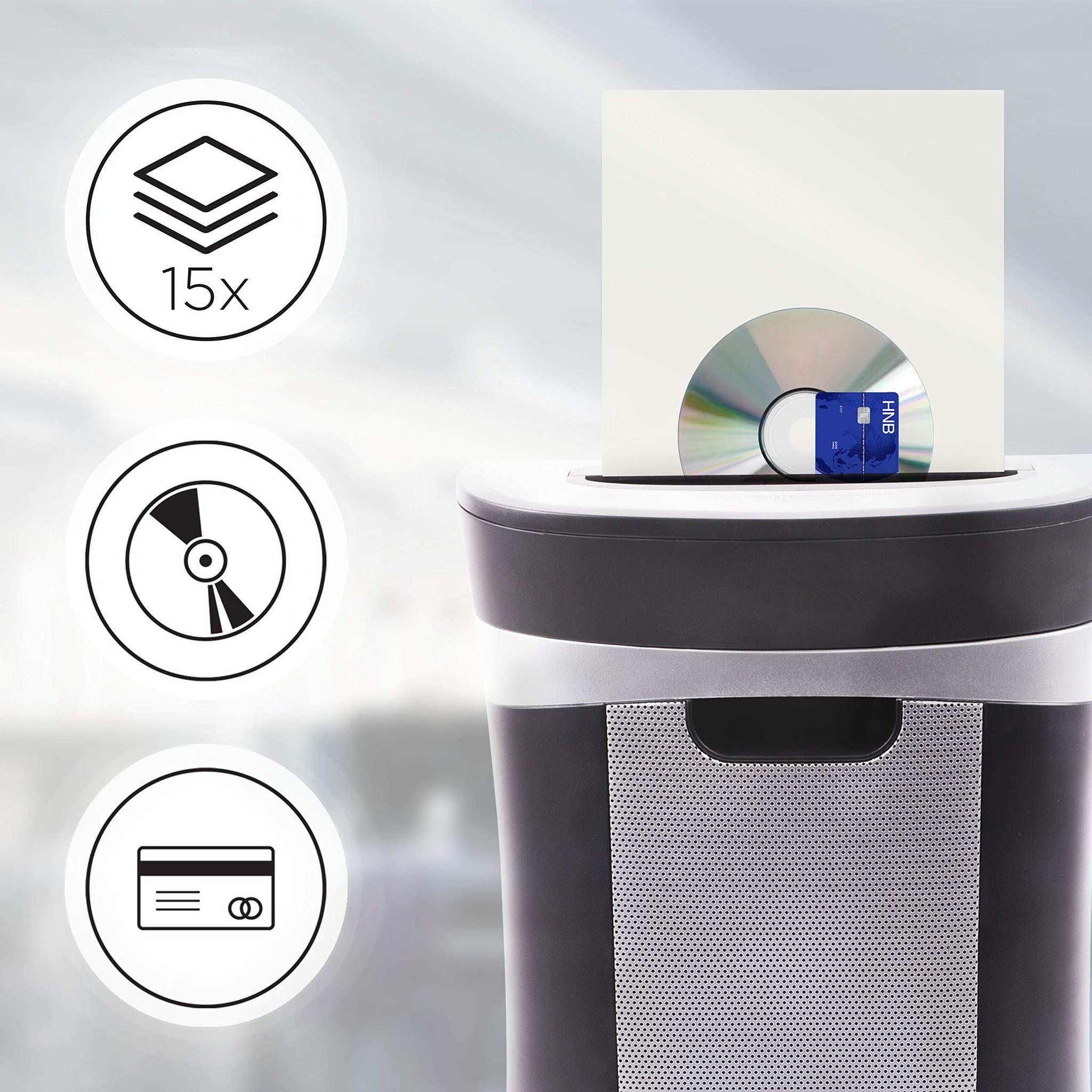 Duronic XXL Cross Cut Paper Shredder destroying a stack of 15 papers, a CD, and a credit card.